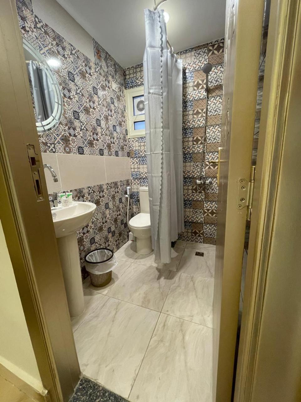 Afnan Cairo Airport Apartment Bagian luar foto